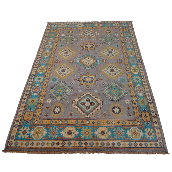 https://cdn.shopify.com/s/files/1/0943/6571/2719/files/Authentic-Kazak-Rug-Hand-Knotted-Wool-Medallion-Carpet-116-192-cm-Aladdinrugs-71419749695823.webp?v=1768183936