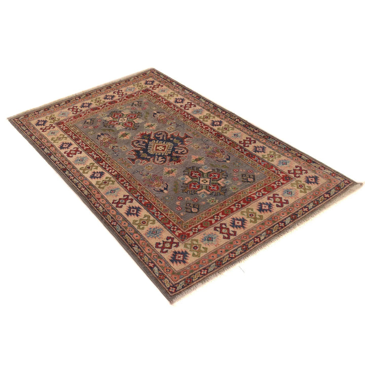 https://cdn.shopify.com/s/files/1/0943/6571/2719/files/Authentic-Oriental-Kazak-Rug-Hand-Knotted-Wool-Medallion-99-152-cm-Aladdinrugs-71419472937295.webp?v=1768186752