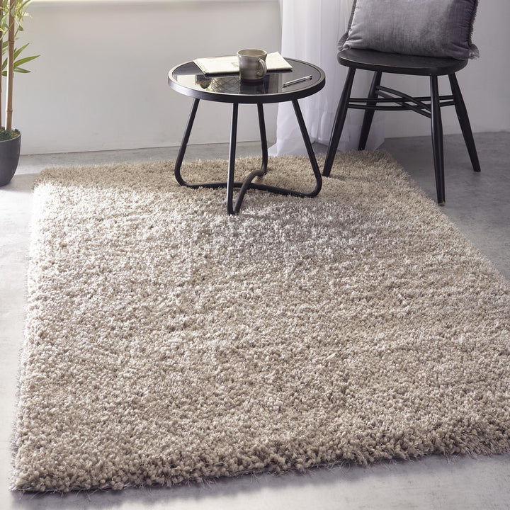 https://cdn.shopify.com/s/files/1/0881/7731/2093/files/Chicago-Taupe-Rug-Lifestyle.jpg?v=1756975023