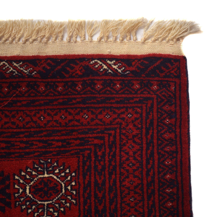 https://cdn.shopify.com/s/files/1/0943/6571/2719/files/Hand-Knotted-Bukhara-Wool-Area-Rug-Classic-Red-Geometric-Pattern-206-292-cm-Aladdinrugs-71790432321871.jpg?v=1770671299