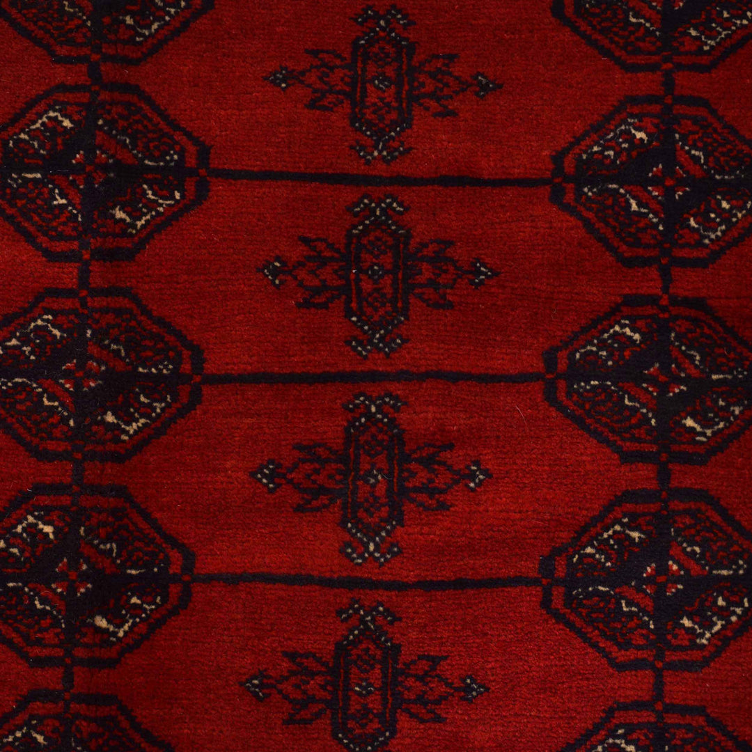 https://cdn.shopify.com/s/files/1/0943/6571/2719/files/Hand-Knotted-Bukhara-Wool-Area-Rug-Classic-Red-Geometric-Pattern-206-292-cm-Aladdinrugs-71790432354639.jpg?v=1768354787