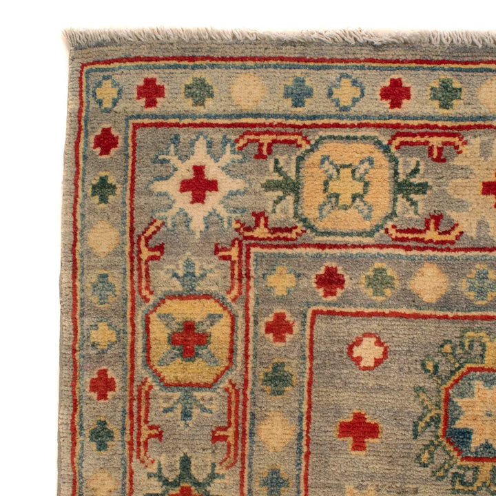 https://cdn.shopify.com/s/files/1/0943/6571/2719/files/Hand-Knotted-Kazak-Oriental-Rug-Wool-Medallion-Carpet-125-188-cm-Aladdinrugs-71419680129359.webp?v=1768184788