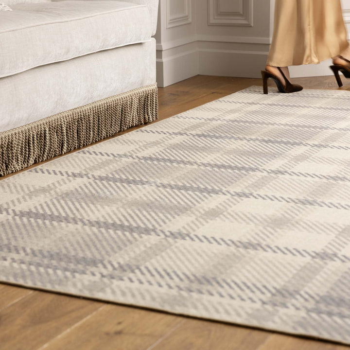 https://cdn.shopify.com/s/files/1/0881/7731/2093/files/Isla-Plaid-Neutral-Rug-Lifestyle_02.jpg?v=1769595012