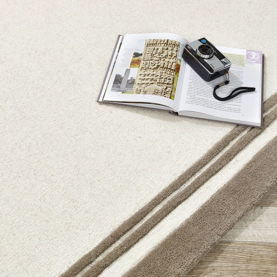Origins Piper Hand Tufted Wool Border Rug in Taupe - beUNIQ - border rug - 080X150 - contemporary living room rug