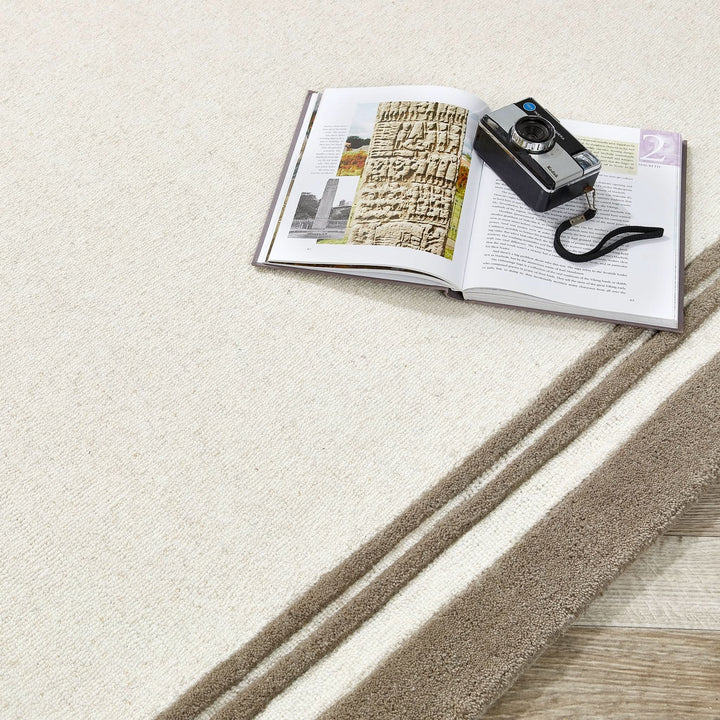Origins Piper Hand Tufted Wool Border Rug in Taupe - beUNIQ - border rug - 080X150 - contemporary living room rug