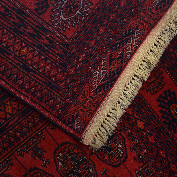 https://cdn.shopify.com/s/files/1/0943/6571/2719/files/Premium-Handmade-Bukhara-Wool-Area-Rug-Traditional-Red-Pattern-213-288-cm-Aladdinrugs-71790399914319.jpg?v=1768352232