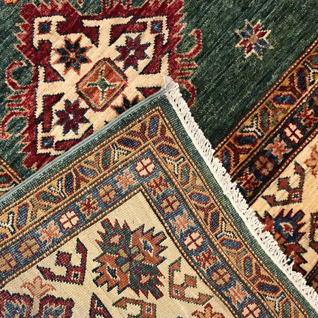https://cdn.shopify.com/s/files/1/0943/6571/2719/files/Premium-Kazak-Wool-Rug-Large-Hand-Knotted-Oriental-Medallion-210-305-cm-Aladdinrugs-71419781218639.jpg?v=1768183859