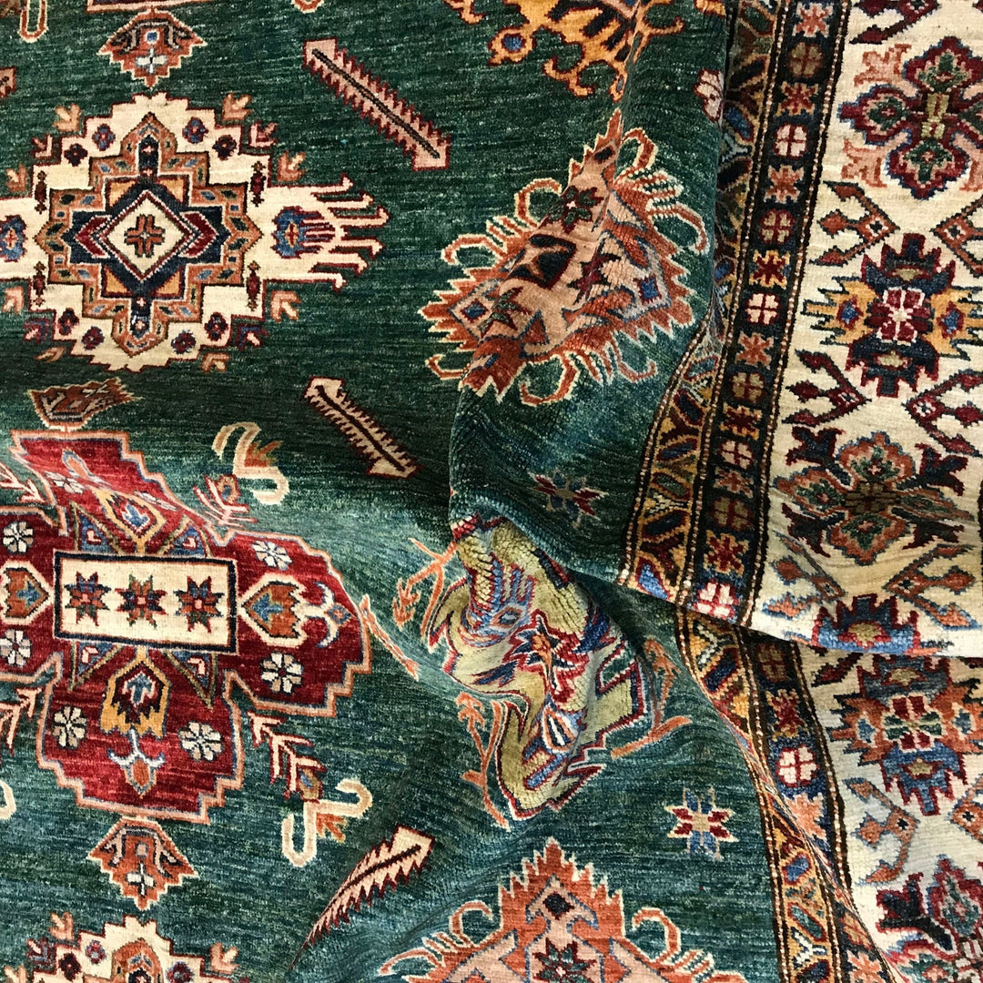 https://cdn.shopify.com/s/files/1/0943/6571/2719/files/Premium-Kazak-Wool-Rug-Large-Hand-Knotted-Oriental-Medallion-210-305-cm-Aladdinrugs-71419781284175.jpg?v=1768183859