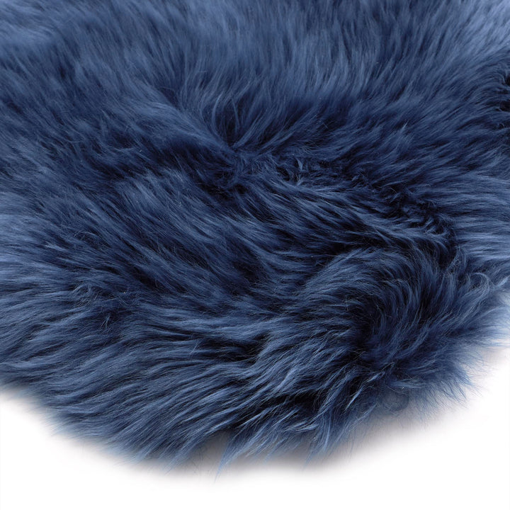 https://cdn.shopify.com/s/files/1/0881/7731/2093/files/Sheepskin-Rug-Navy-Detail_01.jpg?v=1762267700