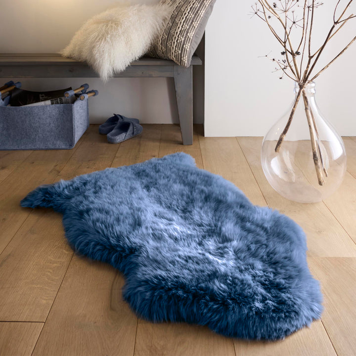 https://cdn.shopify.com/s/files/1/0881/7731/2093/files/Sheepskin-Rug-Navy-Single-Lifestyle_01.jpg?v=1761565876