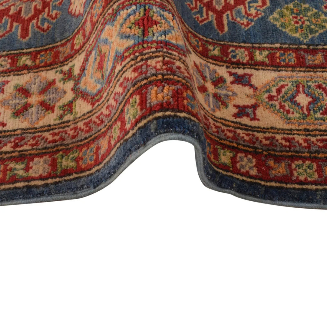 https://cdn.shopify.com/s/files/1/0943/6571/2719/files/Traditional-Kazak-Wool-Rug-Handmade-Blue-Medallion-98-153-cm-Aladdinrugs-71405080478031.webp?v=1768187190