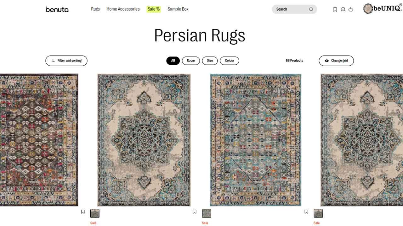 A screenshot of the 'Persian Rugs' category page on the Benuta UK online shop, showcasing a grid of four different intricate rug designs.